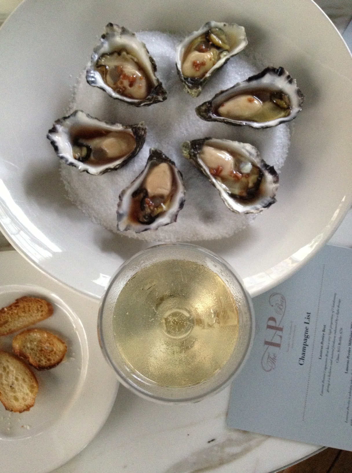 Sydney Rock Oysters with Mignonette dressing paired with Laurent-Perrier Ultra Brut | Sydney Hotspot Find: The L-P Bar Pop-Up | meltingbutter.com